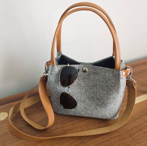 Eco felt mini handbag, made out of recycled felt, made out of recycled plastic bottles, handbag made from recycled plastic bottles, the future of sustainability, eco felt, cross body leather strap